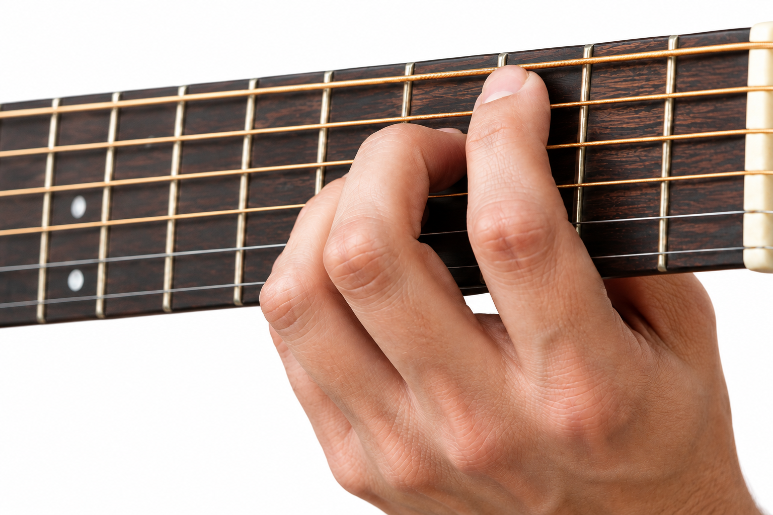 A hand forming a chord on an acoustic guitar